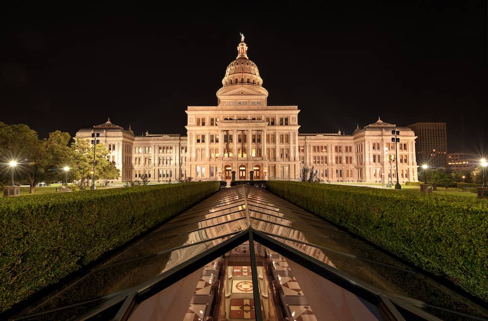 Photo of the Texas Capitol building in Austin lit up at night