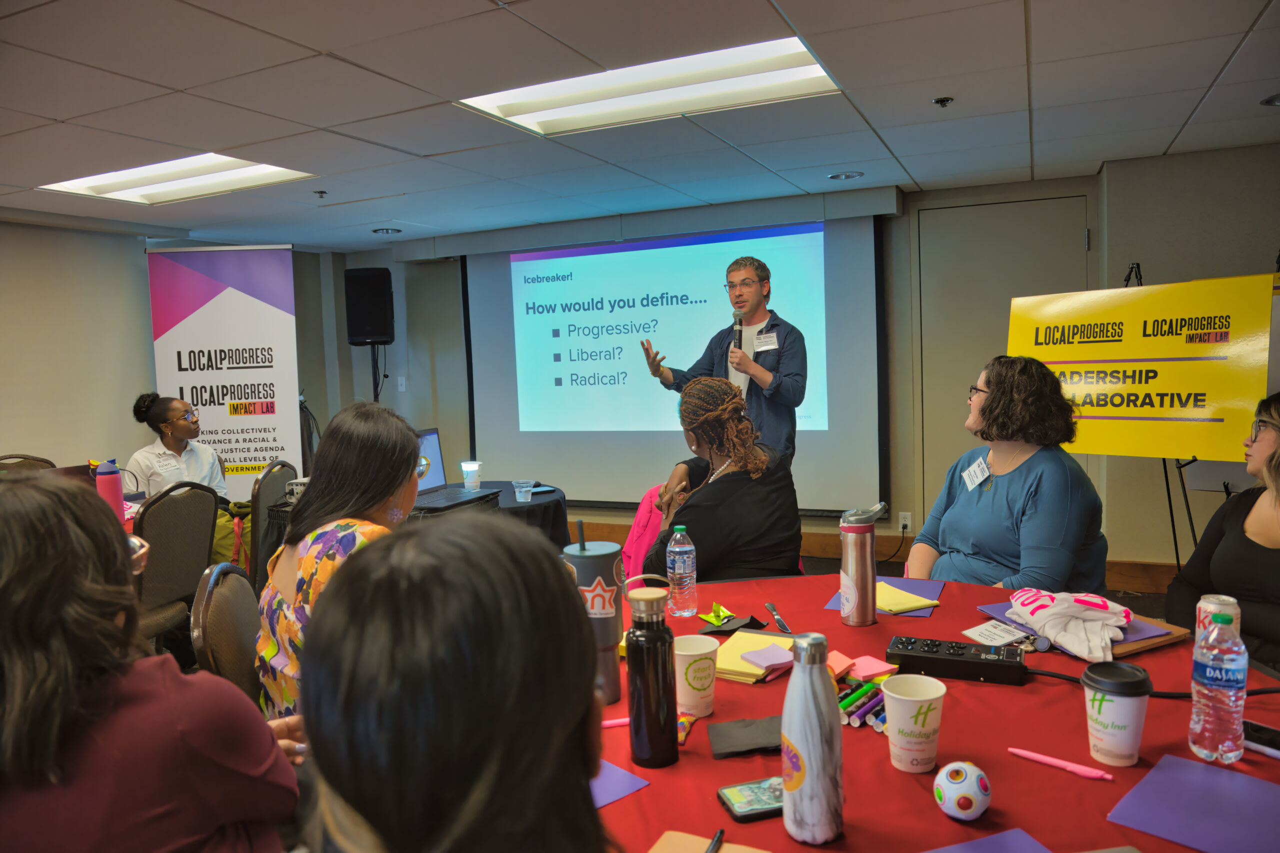 Image of Deputy Comms Director Michael Whitesides giving a comms presentation at a LP event.