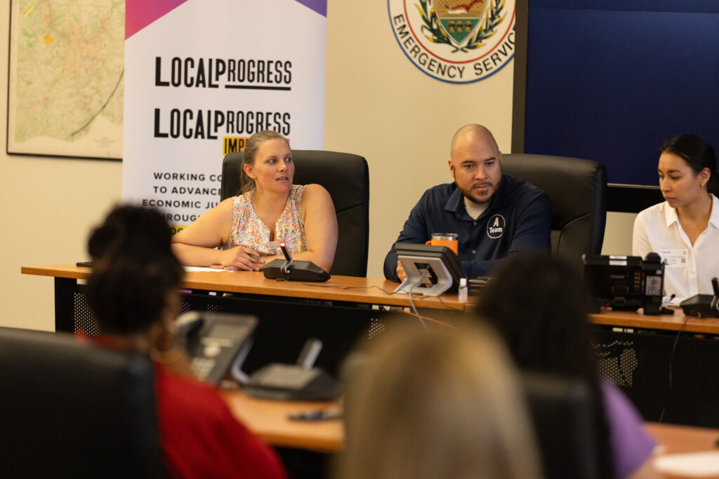 A group of panelists speak