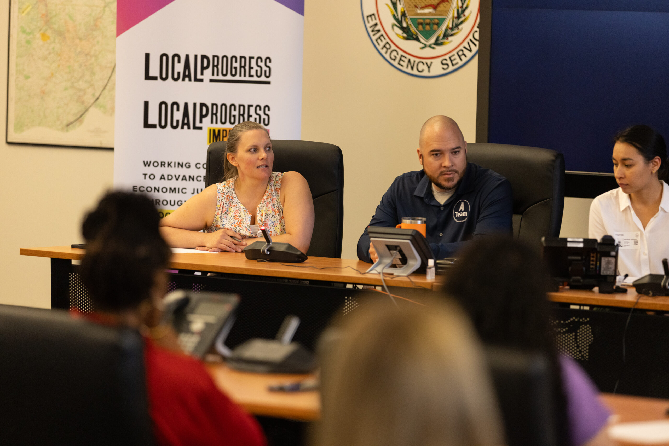 A group of panelists speak