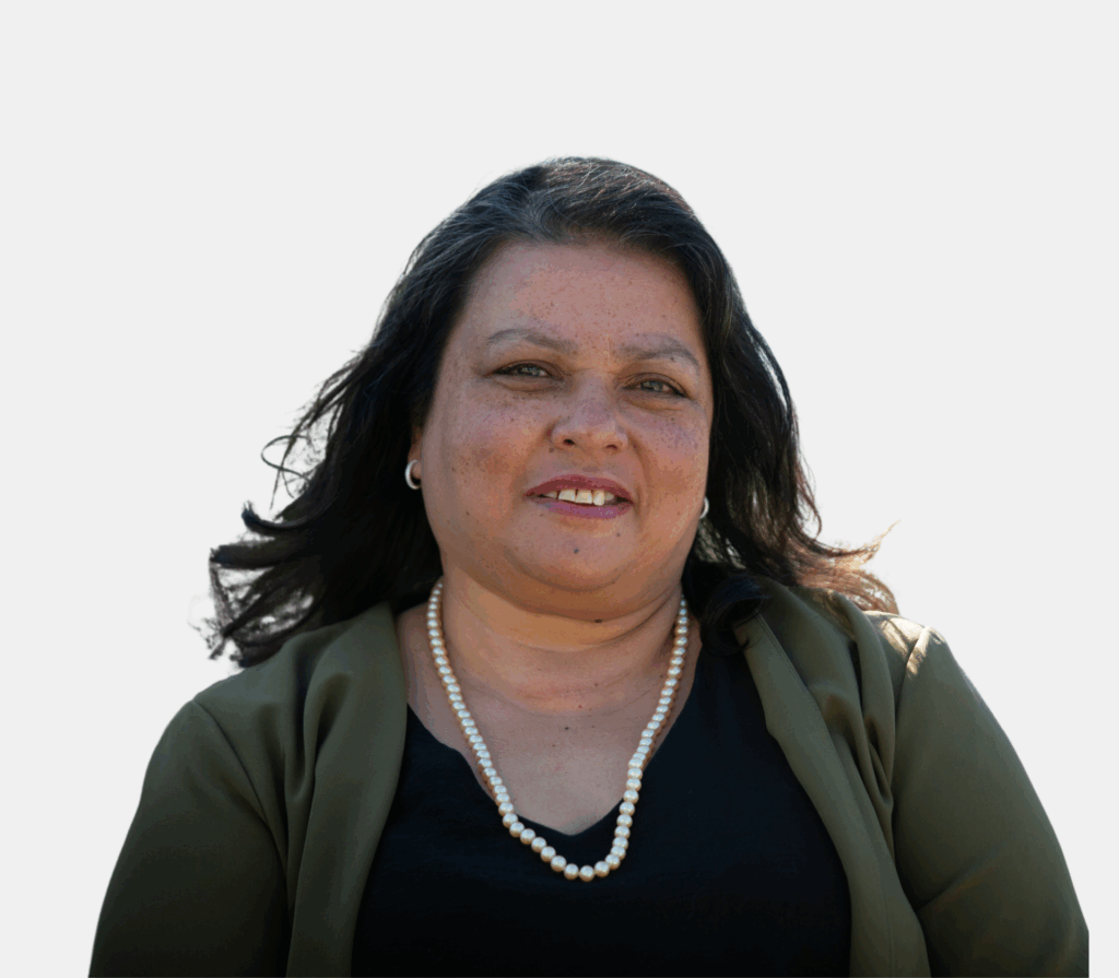 A professional headshot of a woman