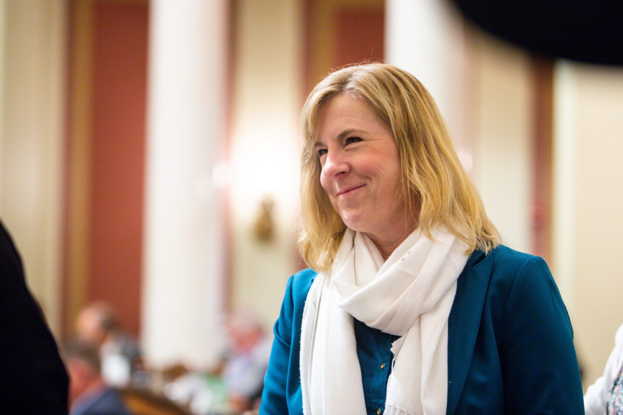Speaker emeritus Rep. Melissa Hortman talks to colleagues during a special legislative session Monday, June 9, 2025 at the Minnesota State Capitol in St. Paul. (Photo by Nicole Neri/Minnesota Reformer)