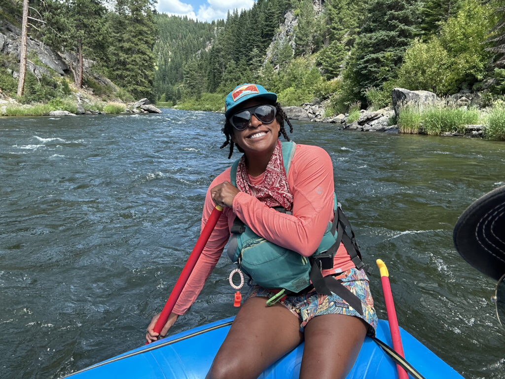 A picture of someone rafting on a river