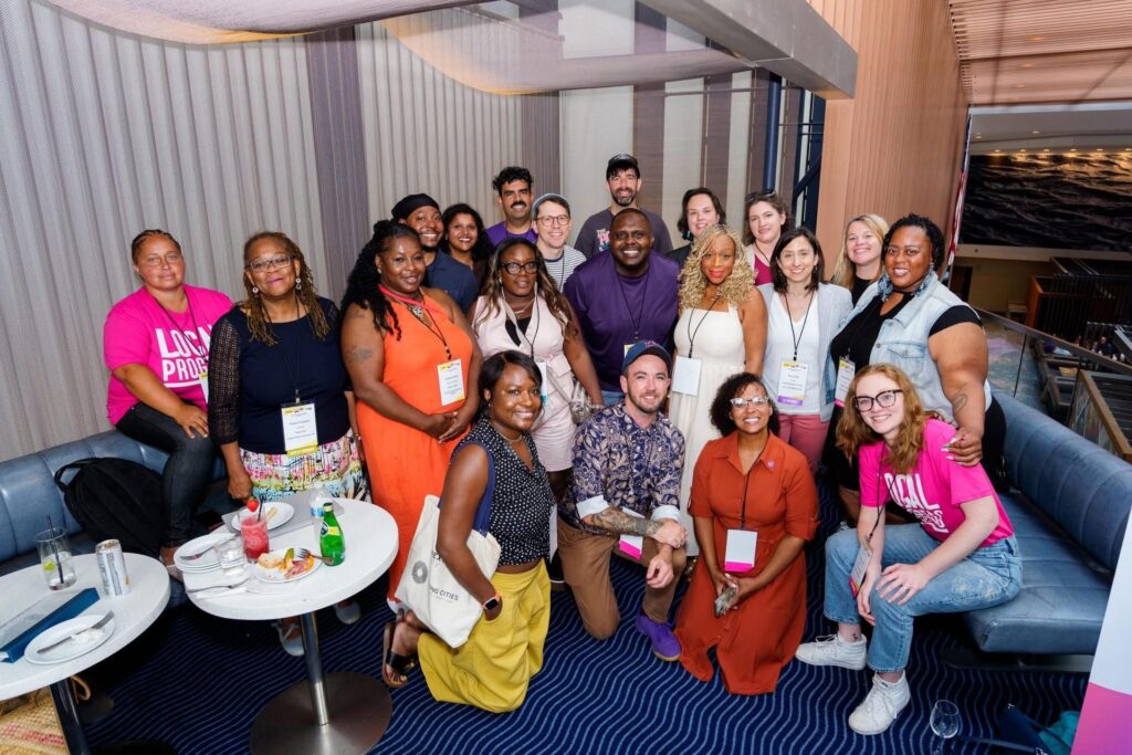 A group photo of people smiling