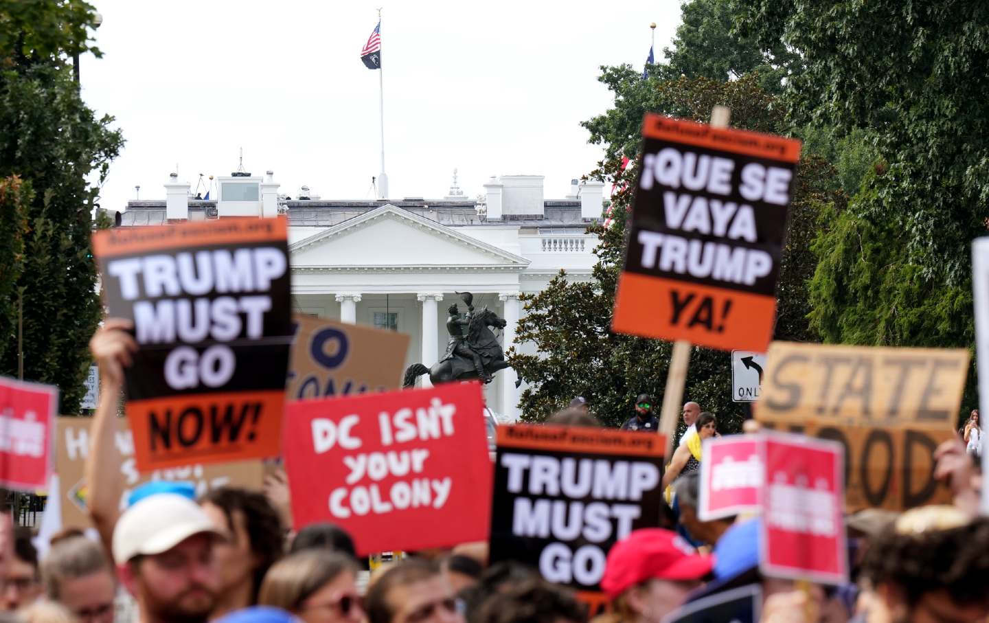 People participate in a rally against the Trump administration’s federal takeover of the District of Columbia on August 11, 2025, in Washington, DC.(Kevin Dietsch / Getty Images)