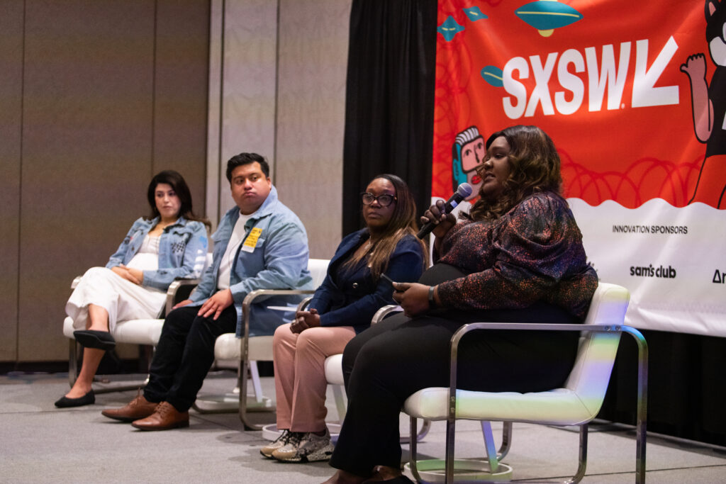Four people on a panel
