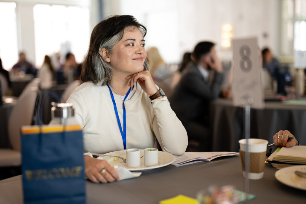 Someone looking over a table and smiling